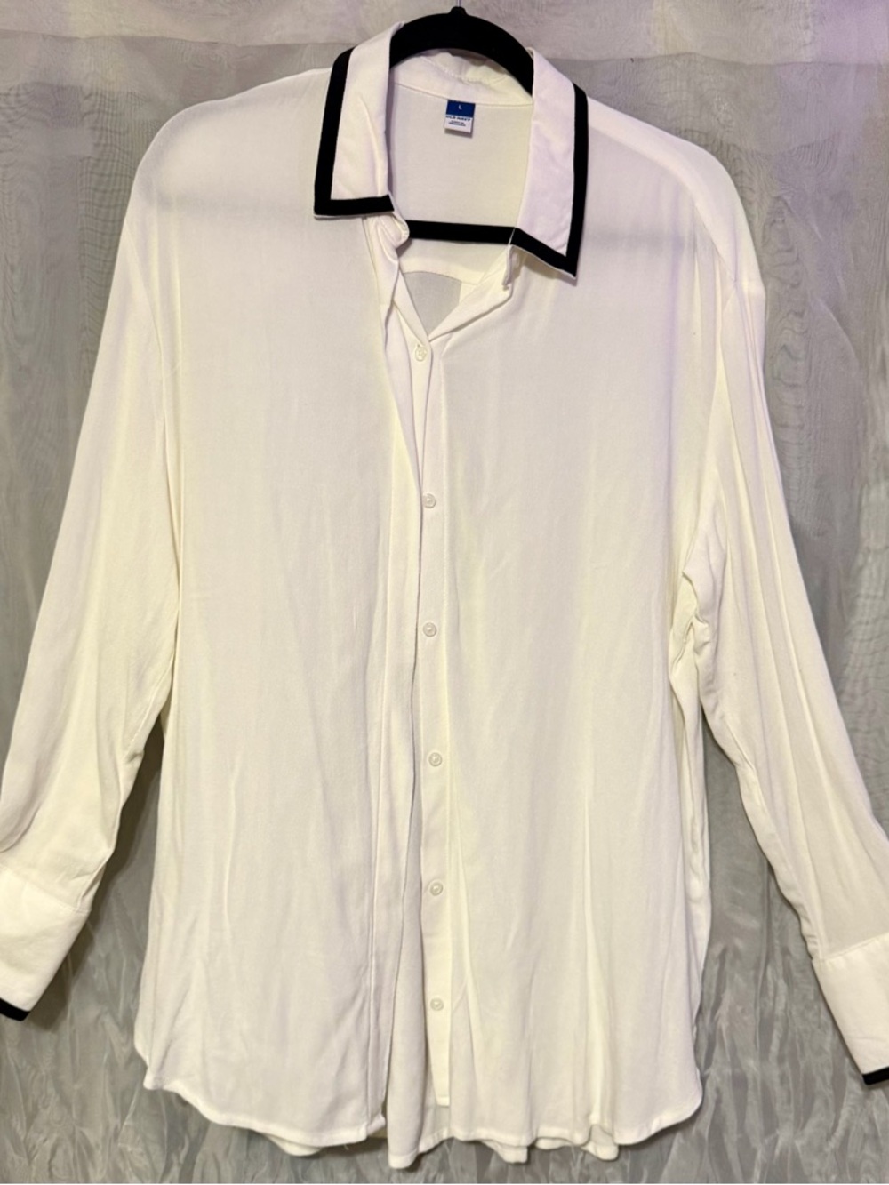 Woman’s White Long-Sleeve Button-Up Shirt with Contrast Trim